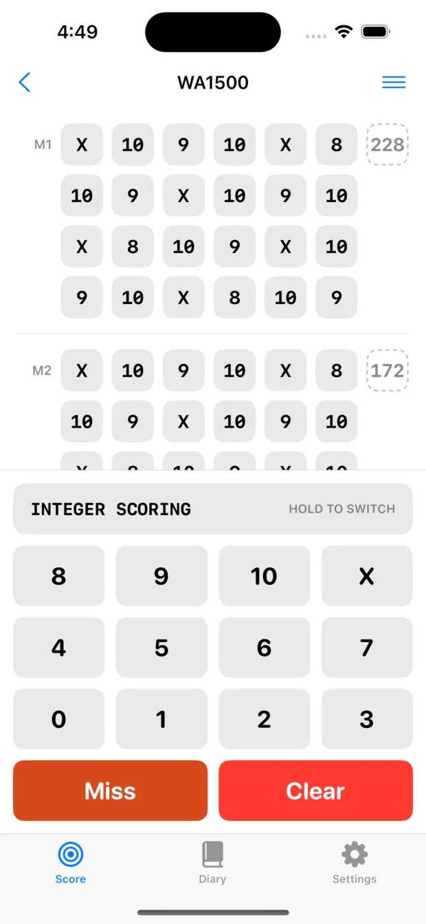 A WA1500 score card being filled in on an iPhone, with the purpose-built score keyboard docked beneath it.